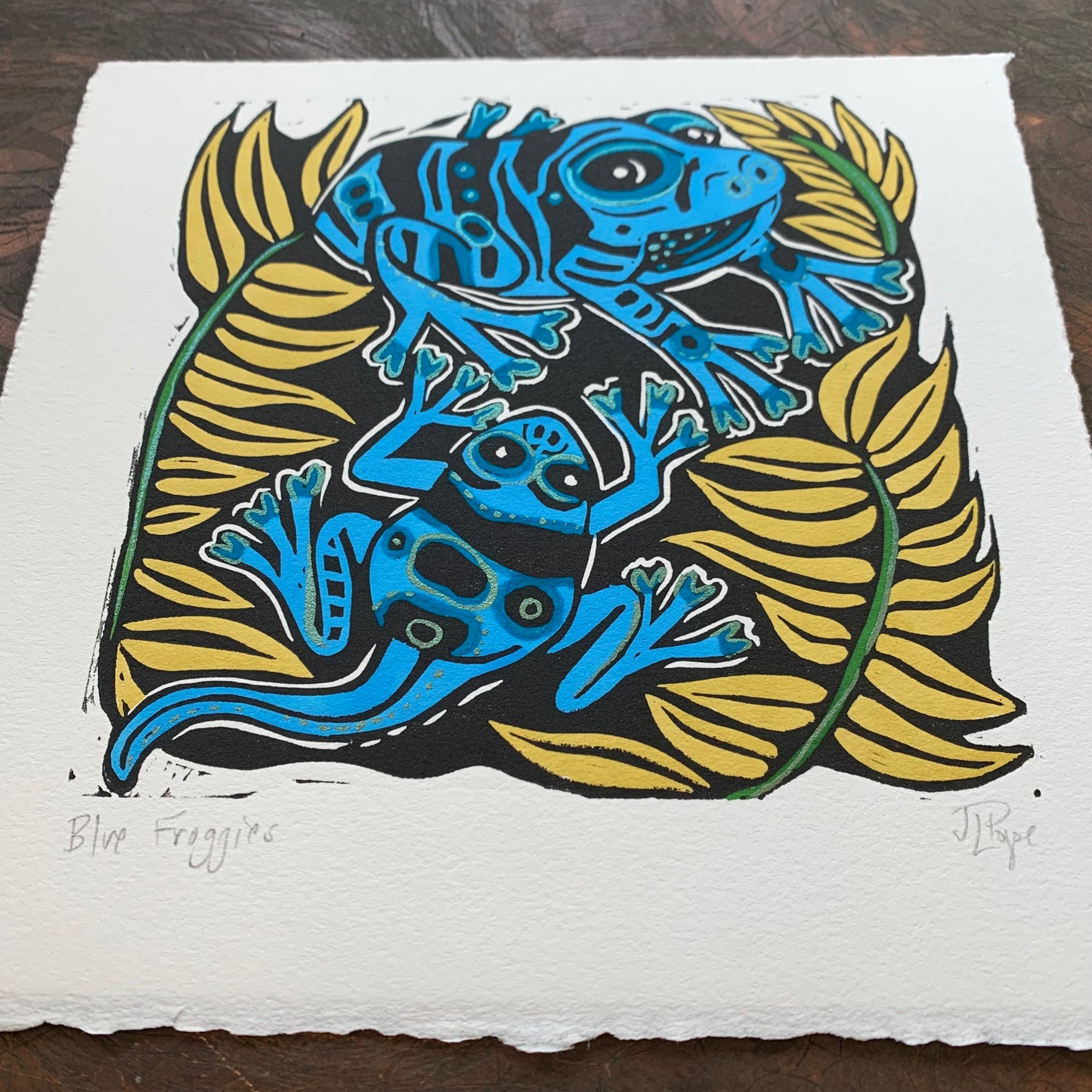 Handpainted blue frog linocut