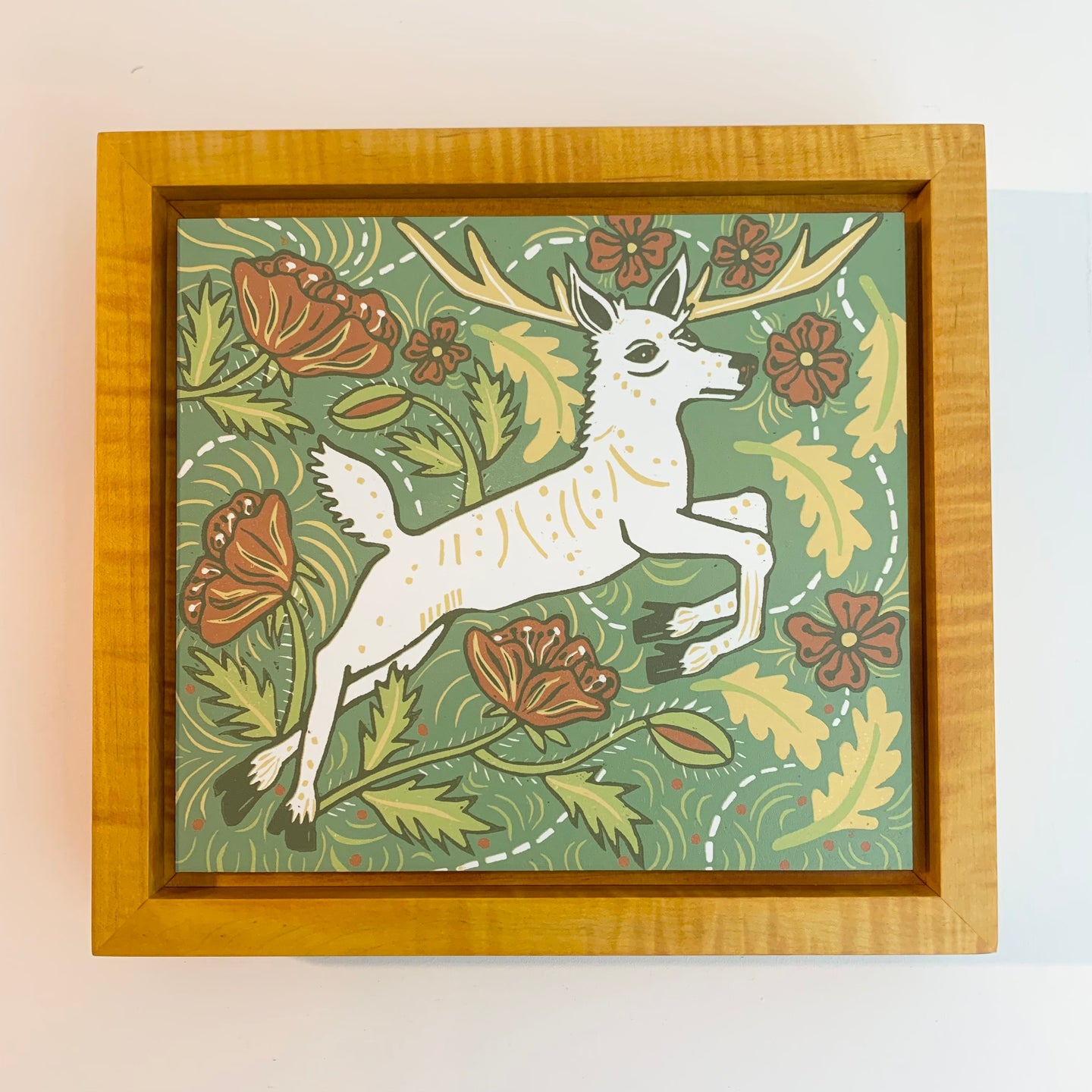 Seneca white deer framed in yellow solid tiger maple wood
