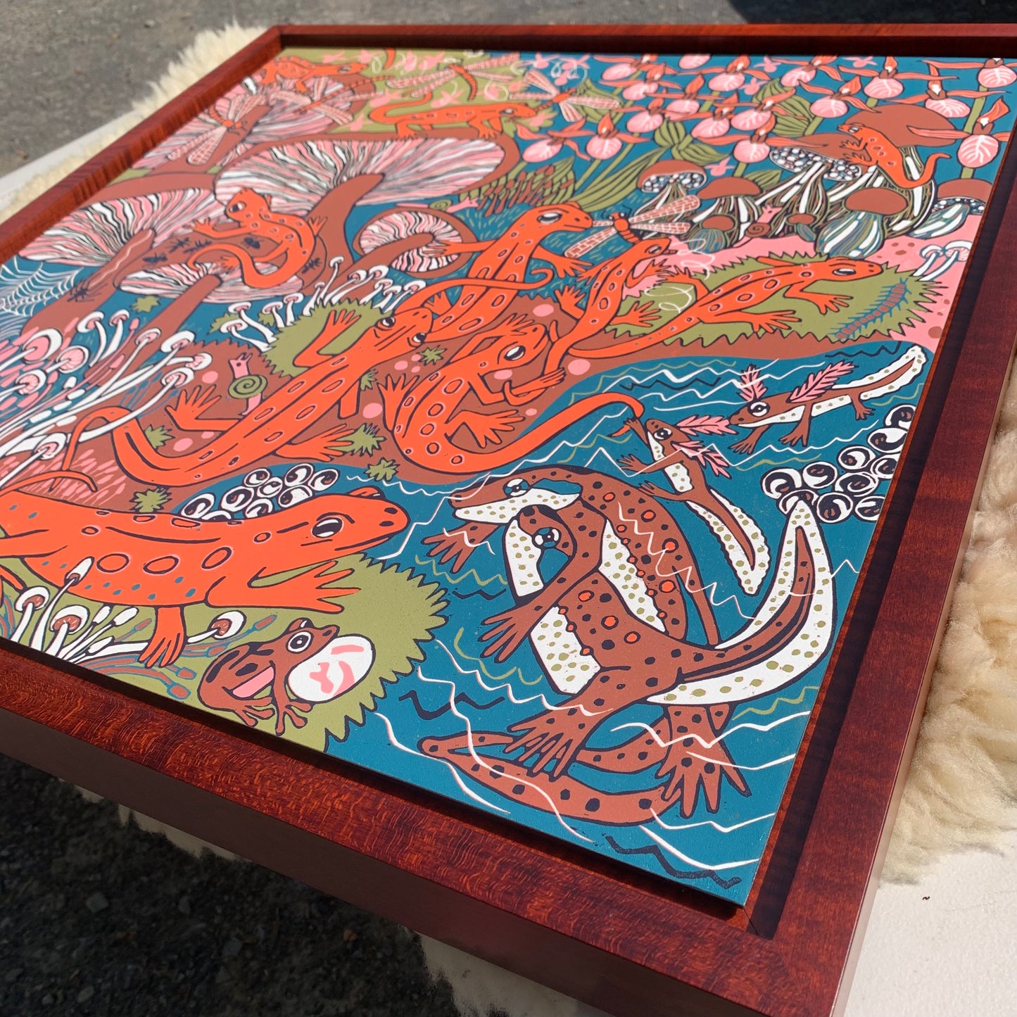 Red eft and mushroom and orchid framed woodcut