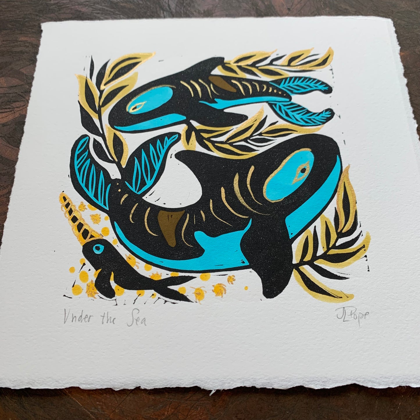 Kelp and orca linocut