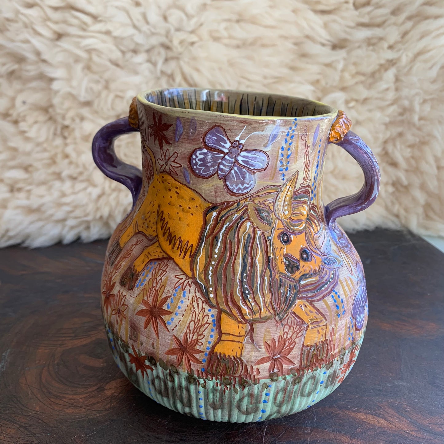 Bison and blue butterfly vase