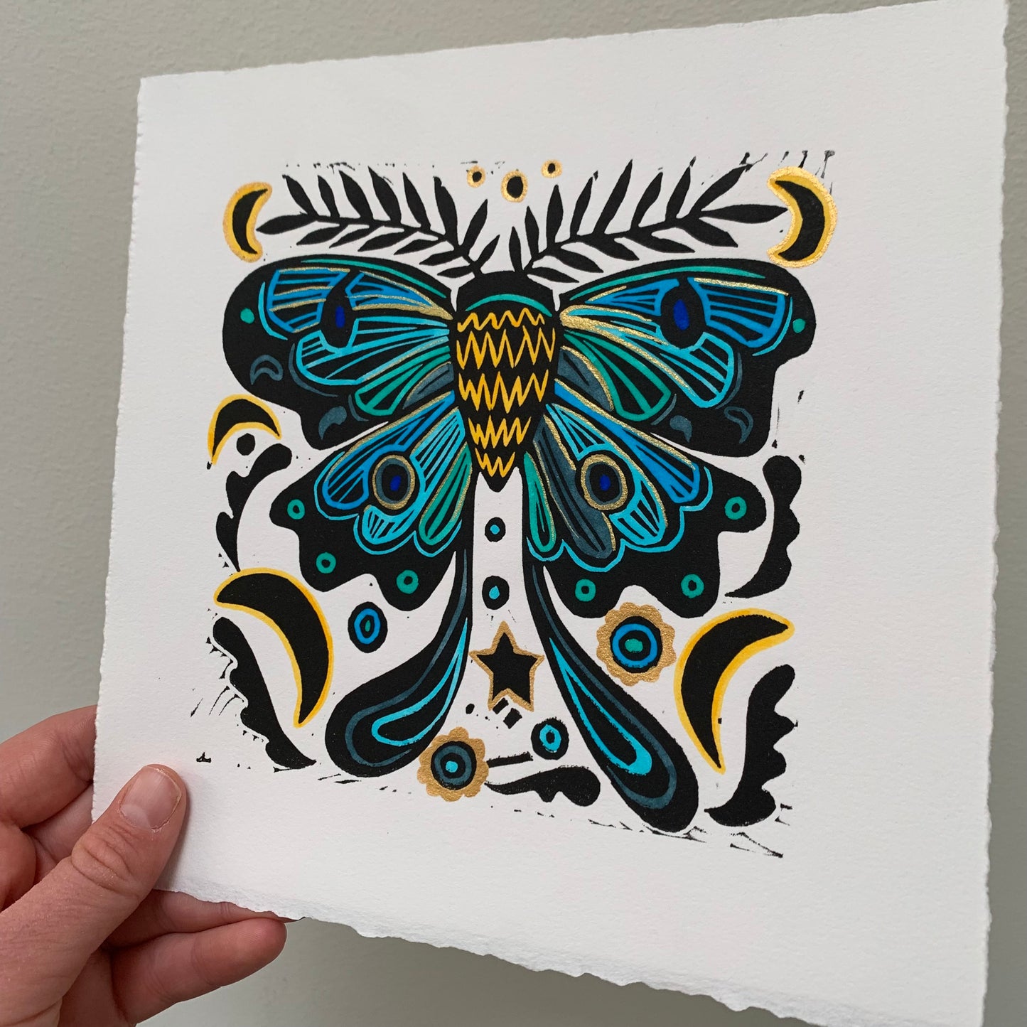 Blue moth linocut