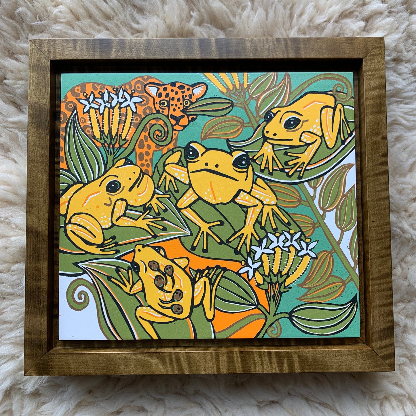 Pre-order Dart frog woodcut framed in olive green solid tiger maple wood