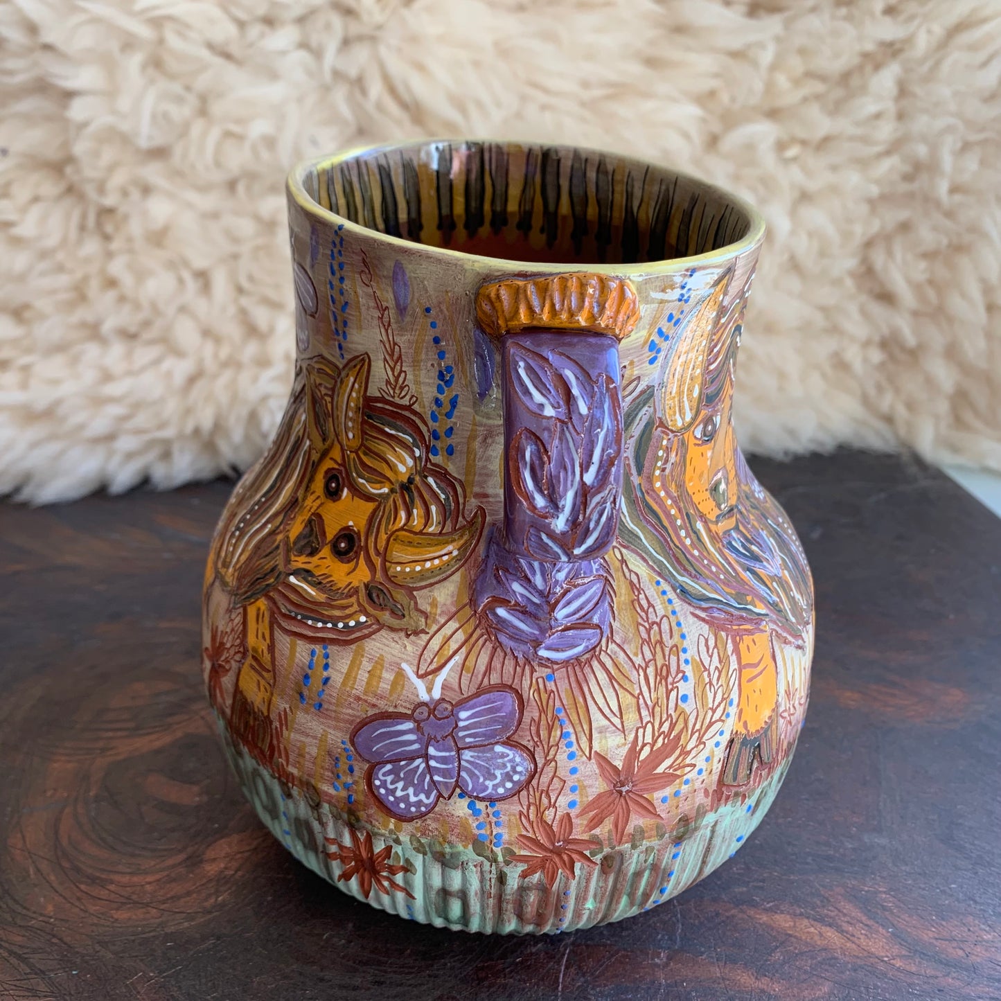 Bison and blue butterfly vase