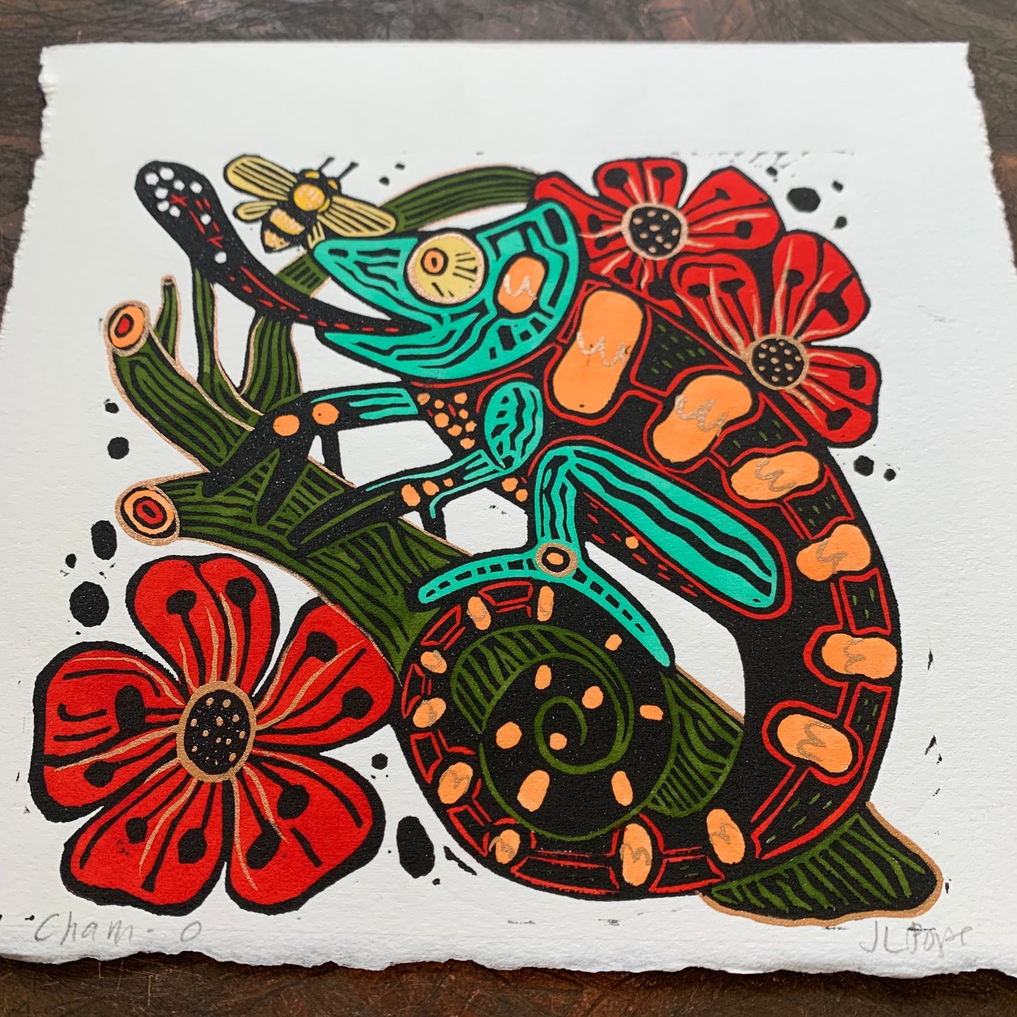 Handpainted festive chameleon linocut