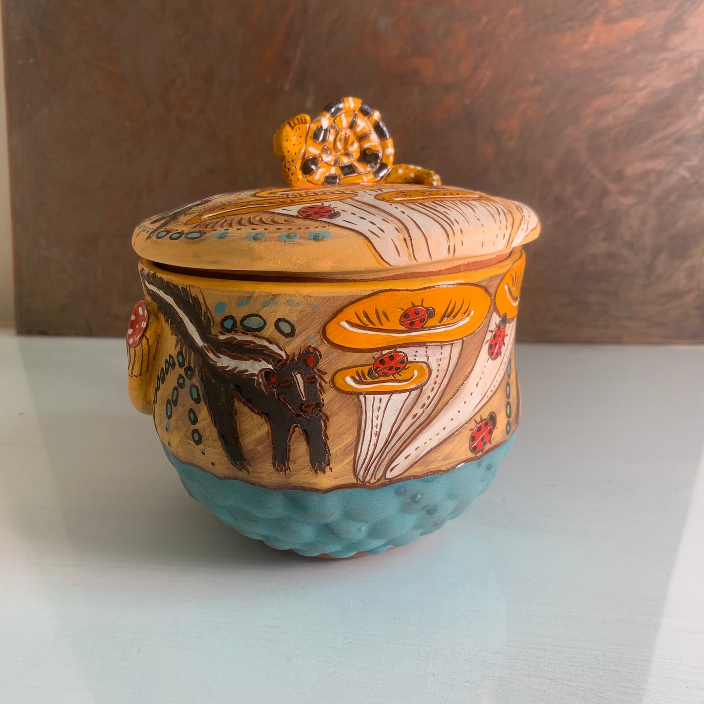 Skunk and mushroom jar