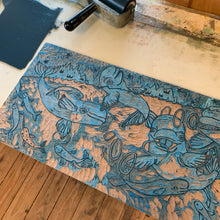 Load image into Gallery viewer, Beluga woodcut with little whales in the big whales