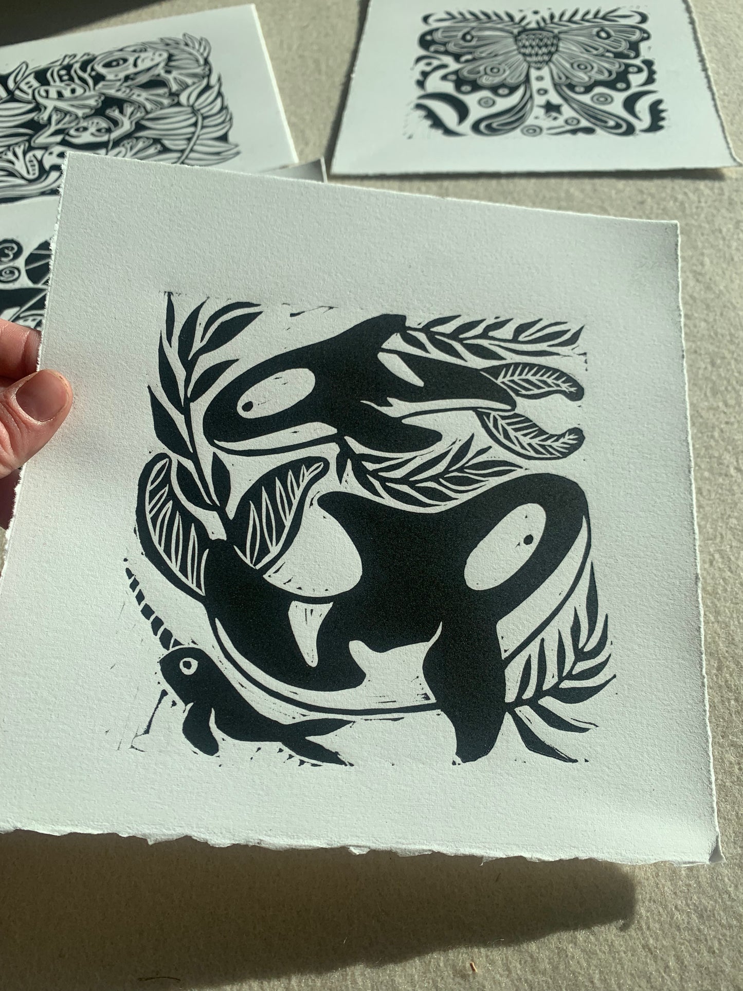 Orca and kelp linocut