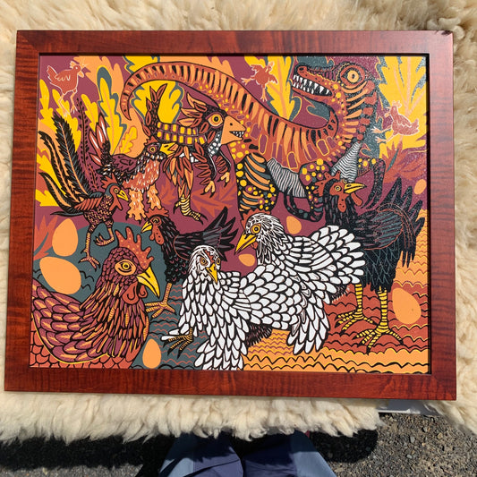 Evolution of chickens woodcut framed in curly maple
