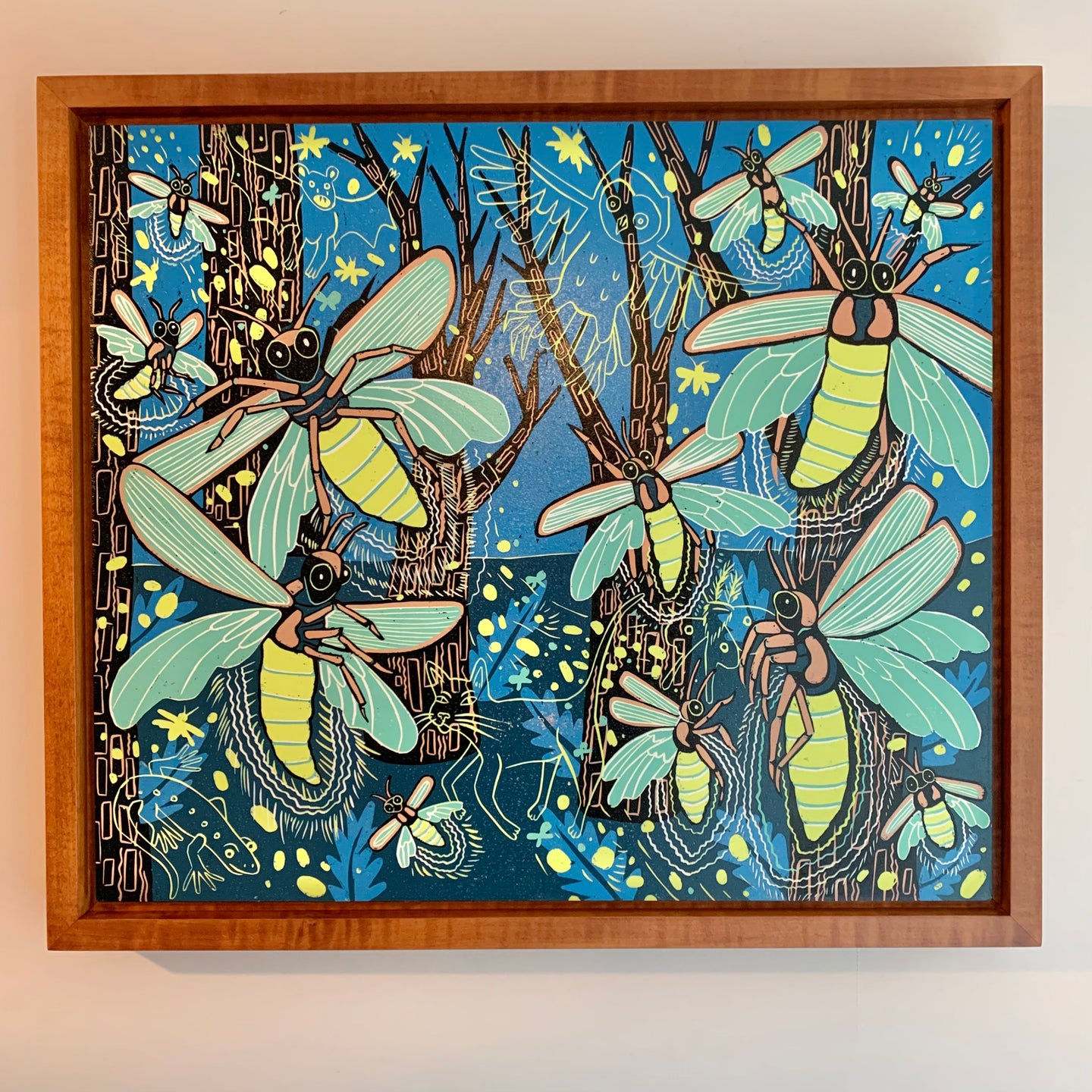 Please allow 3 weeks for delivery—lightning bug woodcut framed in nutmeg