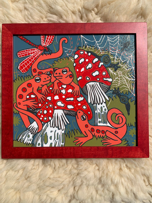 Red eft and mushroom framed in red