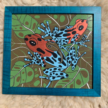 Load image into Gallery viewer, Dart frog woodcut framed in solid tiger maple wood
