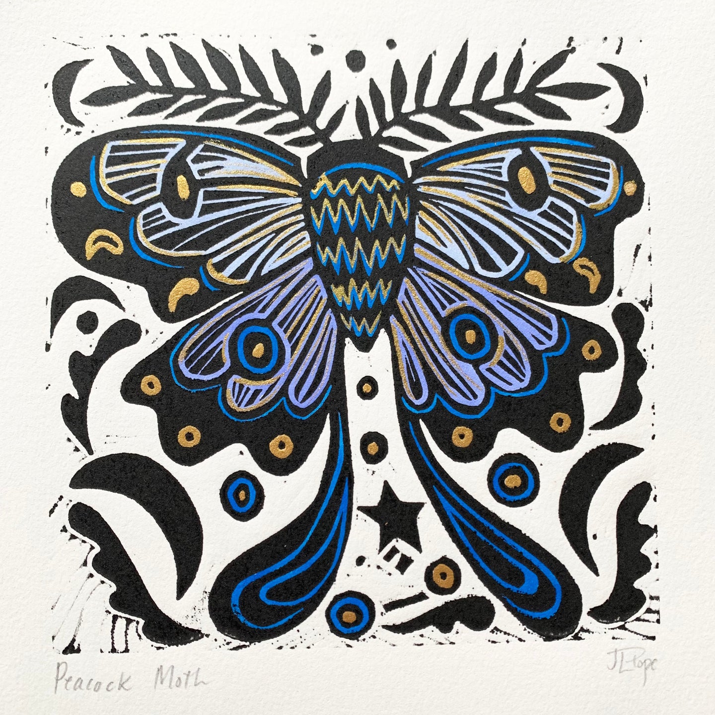 Handpainted blue moth linocut
