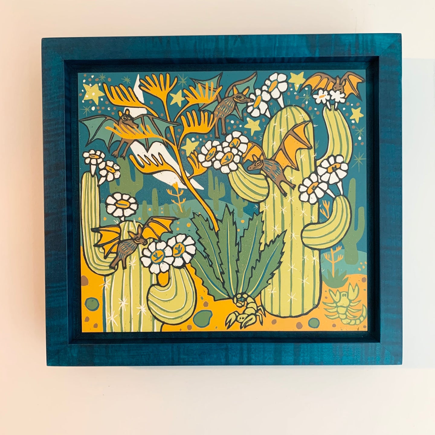 Cactus bats framed in blue solid tiger maple wood