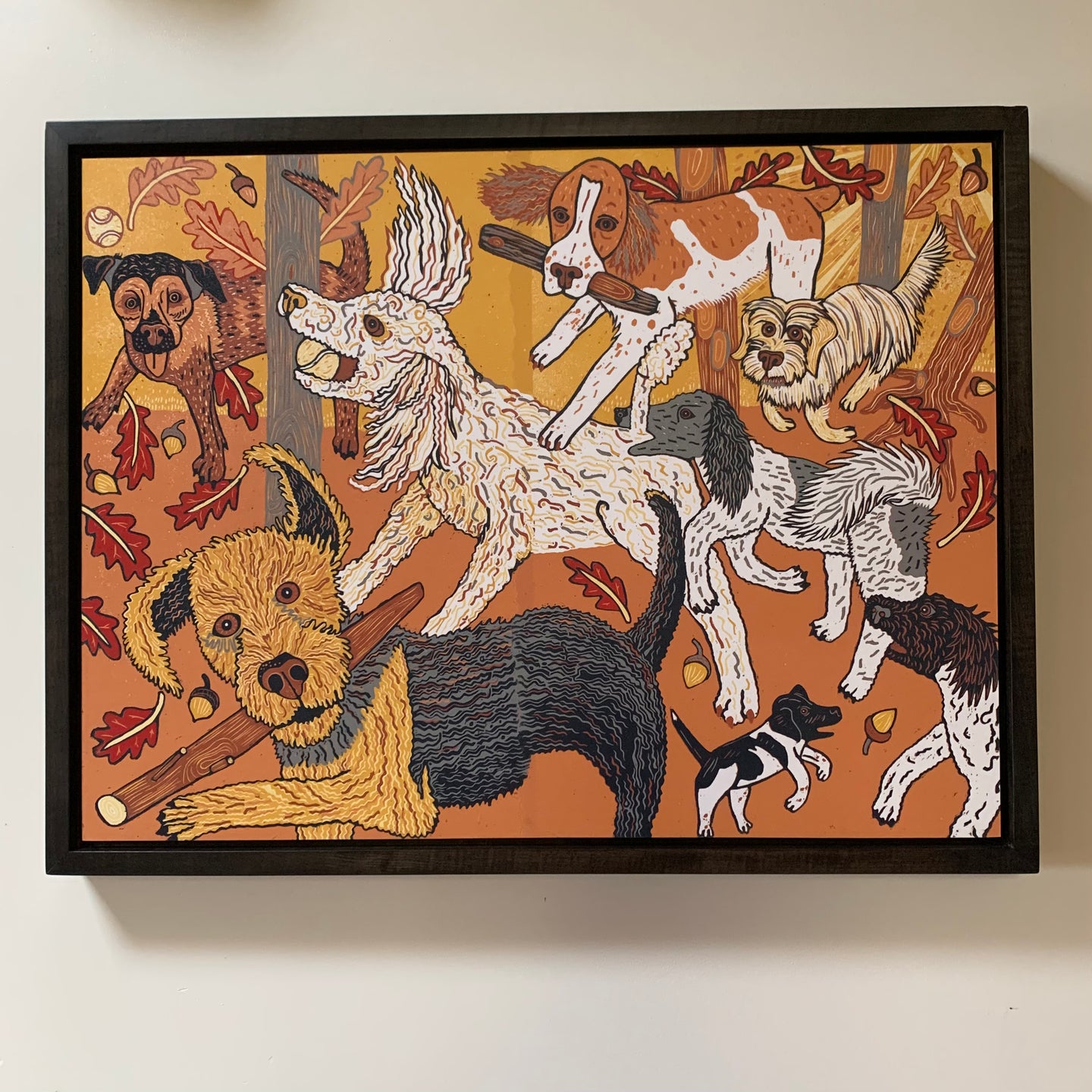 Big dog woodcut with poodles and friends framed in black