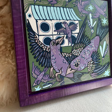 Load image into Gallery viewer, Purple Martin woodcut framed in a purple frame
