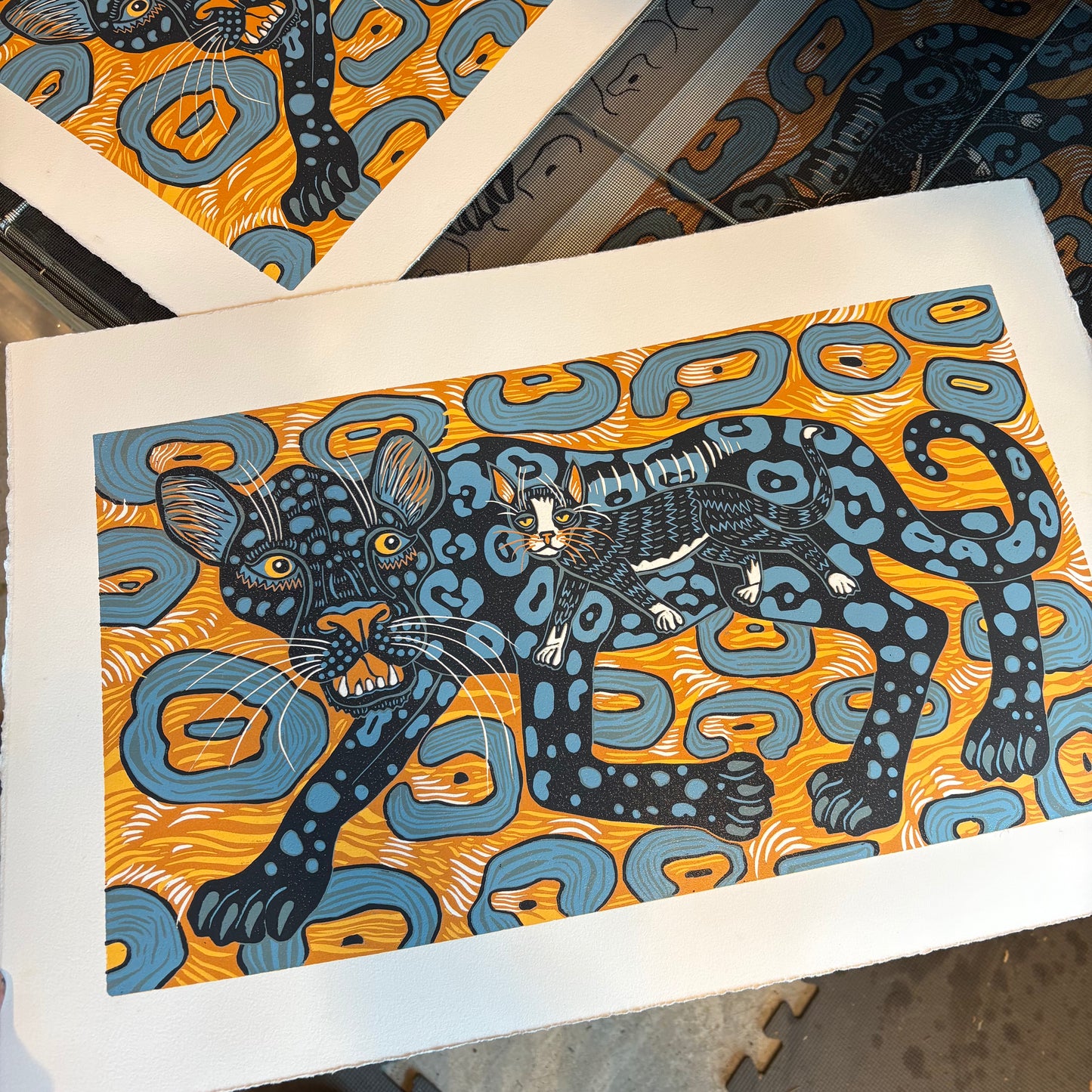 Panther and tuxedo cat original woodcut