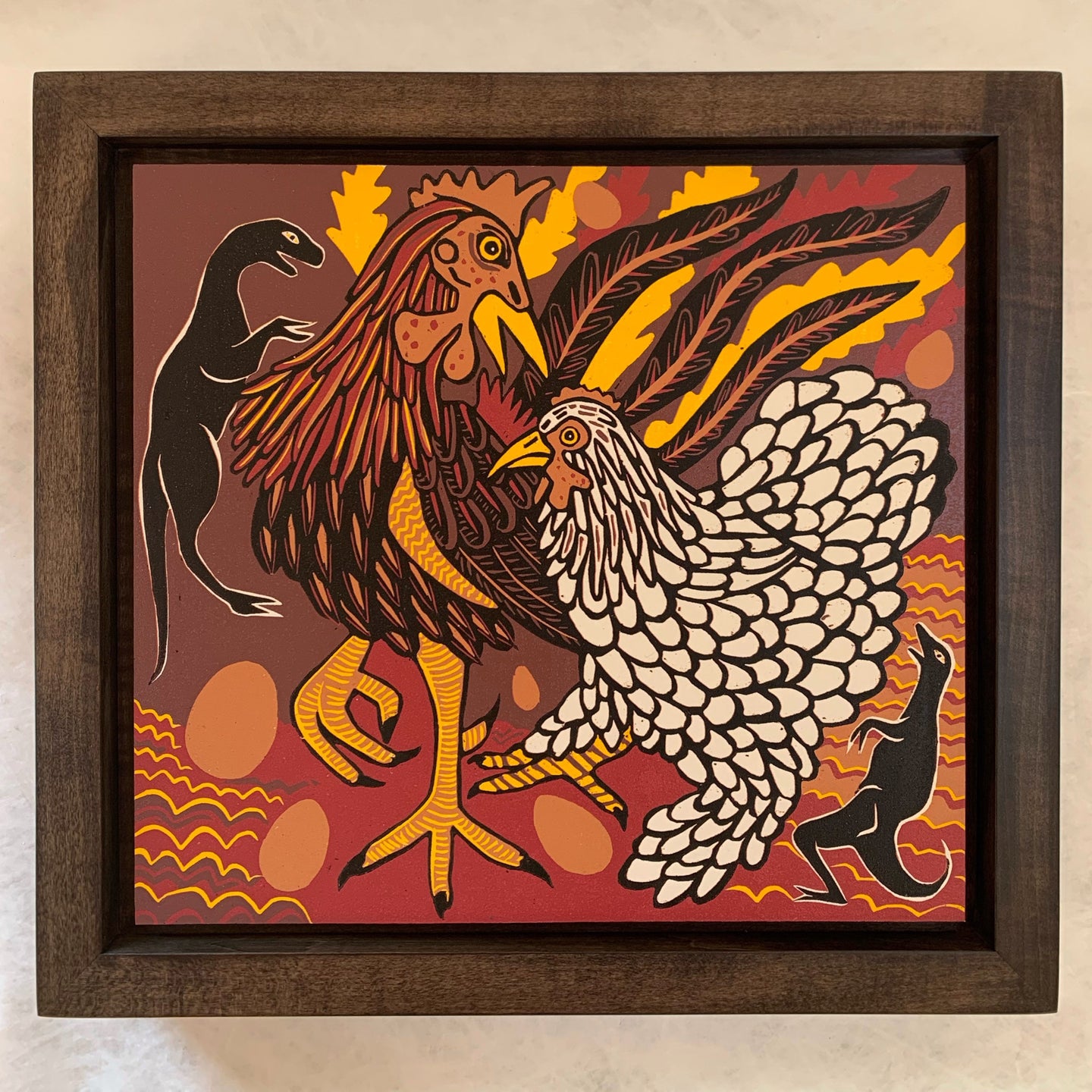 Chicken woodcut framed in black solid tiger maple wood